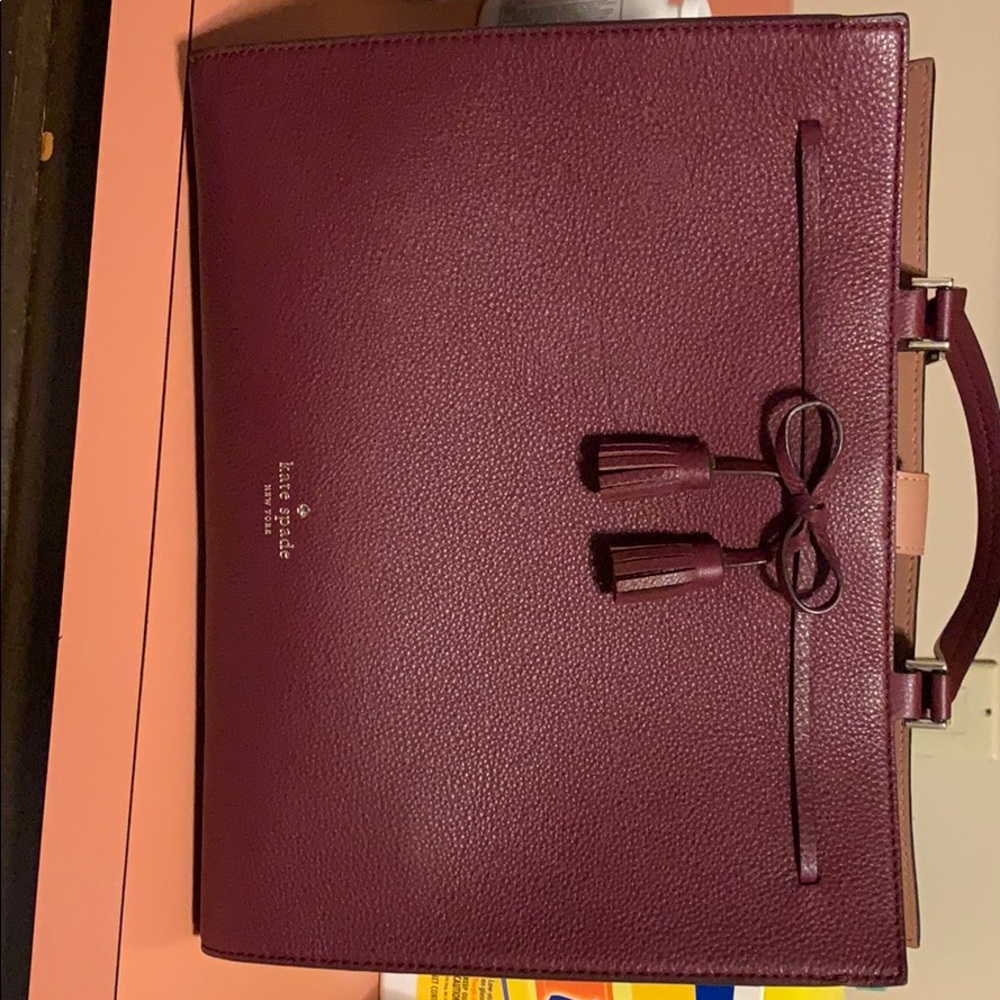 Maroon Kate Spade tote w matching wallet.